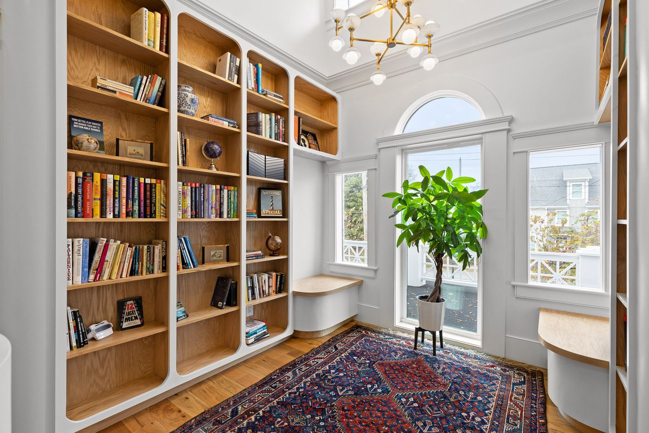 Built-in library shelving in solid timber