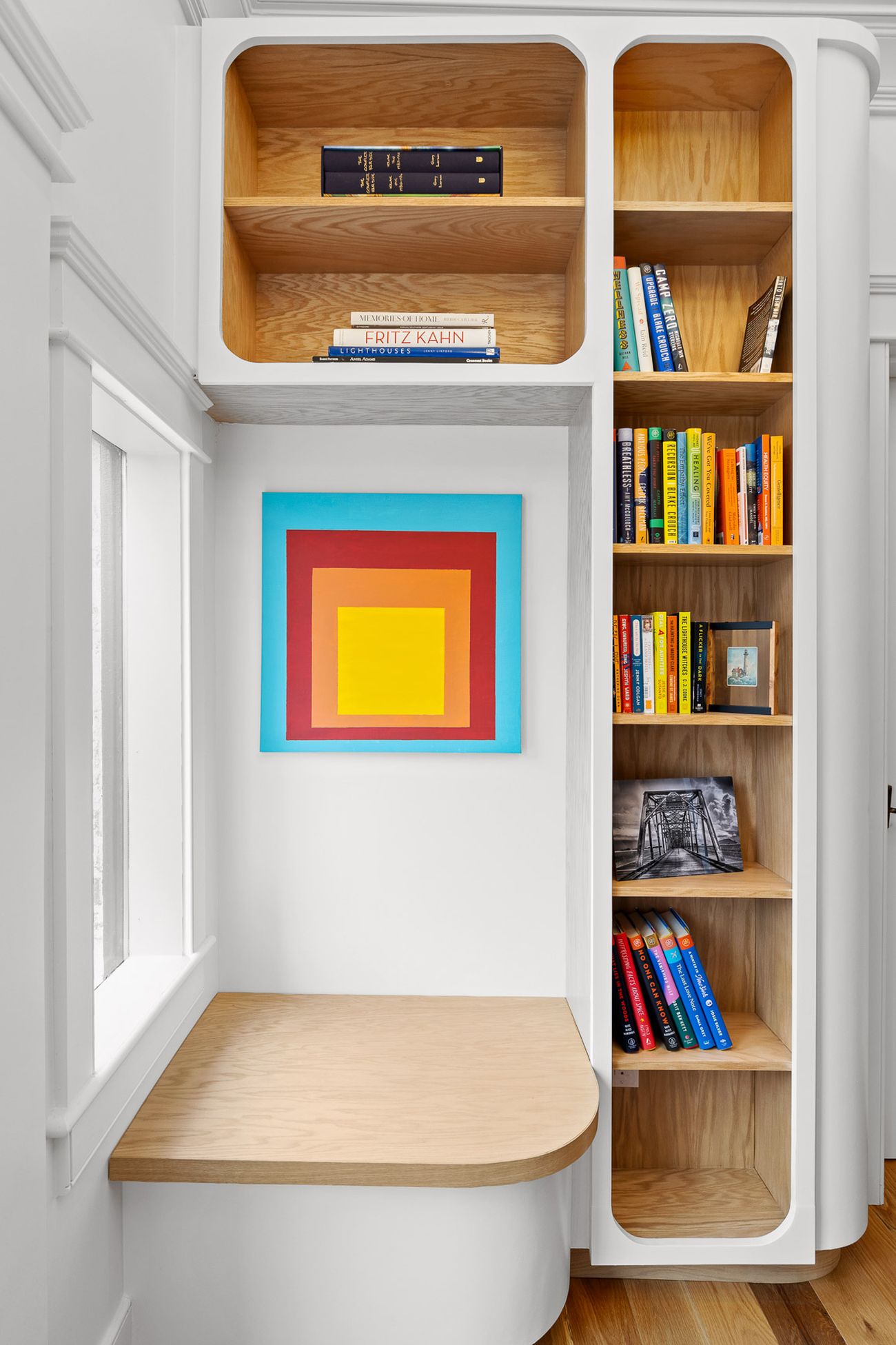 Handcrafted library joinery and reading nook