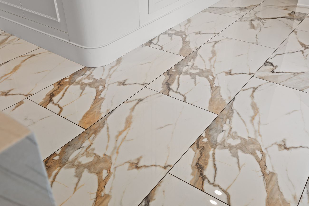 Handcrafted cabinetry and marble surfaces