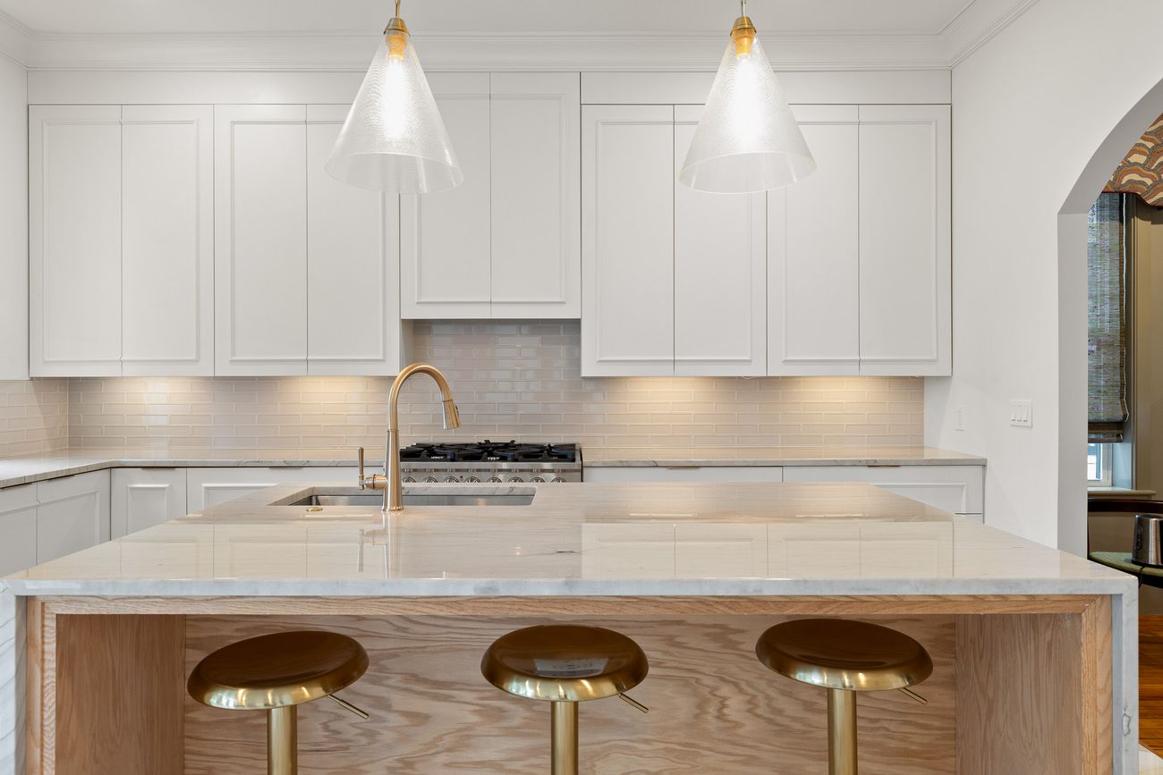 Bespoke kitchen joinery with brass detailing